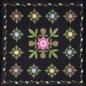 Black quilt with flowers